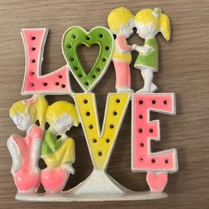 Vintage metal earring holder tree love spell out with boy and girl 70s vibes